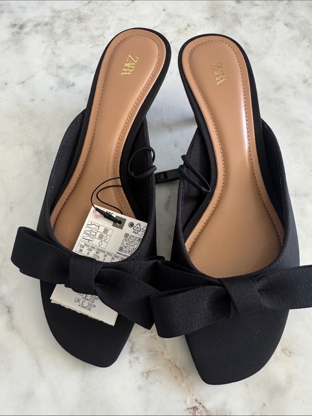 Zara 
BOW HEELED SANDALS